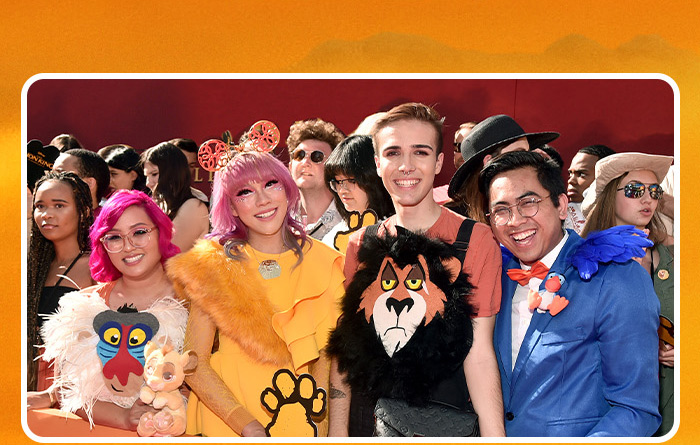 D23 fans dressed in Mufasa-themed costumes