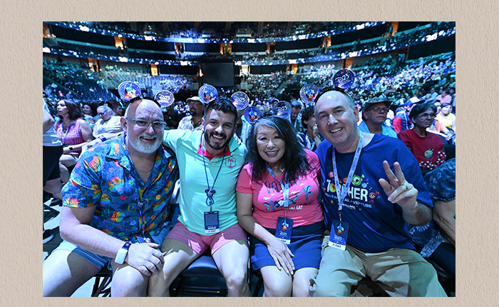 A group of D23 fans wearing Mickey Mouse ears at TUDFE