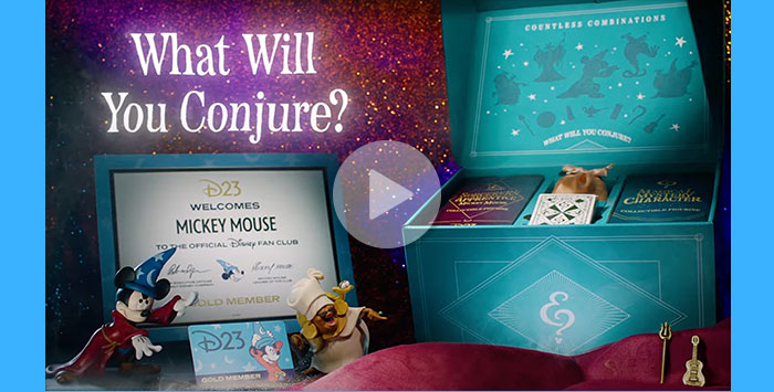 A video thumbnail of the D23 Gold Member Collector set. A play carrot is on the center . On  the left it reads, ‘What will you conjure?’  