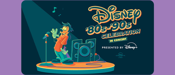 Disney '80-'90s Celebration in Concert Presented by Disney Plus, with Goofy singing on sate next to a large speaker and microphone.