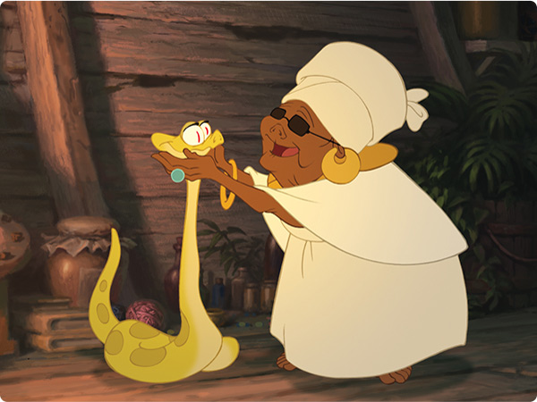 Mama Odie from The Princess in the Frog smiling with her snake, Juju, while extending her arms to Juju's neck.