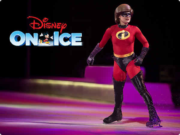 Live-action skater dressed as Violet Parr from The Incredibles glides across the ice during a Disney On Ice show.