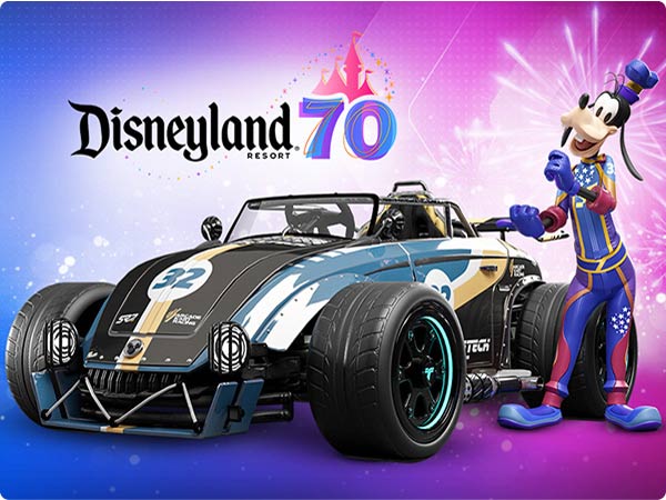 Goofy in racing gear stands beside a stylized racer; text reads “Disneyland 70” with fireworks over a pink-purple sky.