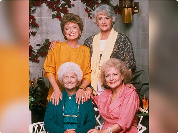 Golden Girls cast photo with Bea Arthur, Rue McClanahan , Estelle Getty, and Betty White smiling together.