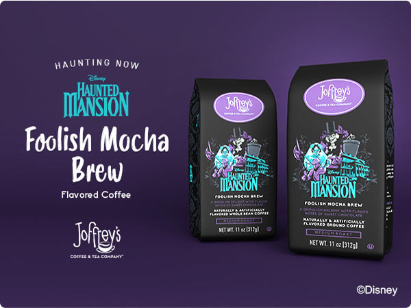 “Haunted Mansion Foolish Mocha brew coffee bags by Joffrey’s with purple packaging and ghostly artwork.
