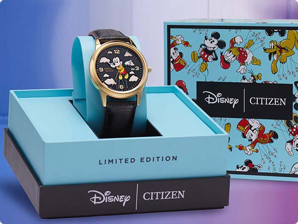 Limited-edition Disney x Citizen watch featuring Mickey Mouse with clouds on the dials, displayed in collectible packaging.
