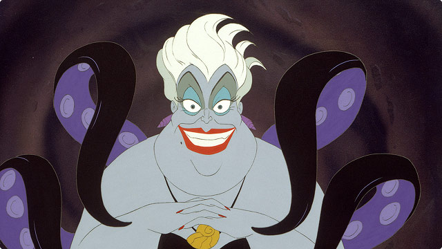 Ursula from The Little Mermaid smiling with tentacles curled around her.